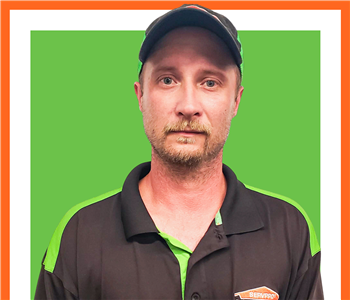 SERVPRO employee, Richard Patterson, male with hat on